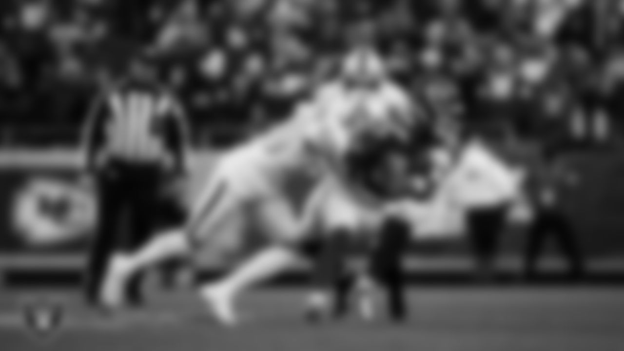 Las Vegas Raiders safety Isaiah Pola-Mao (20) makes a tackle during the regular season away game against the Kansas City Chiefs at GEHA Field at Arrowhead Stadium, Friday, November 29, 2024, in Kansas City, Mo.