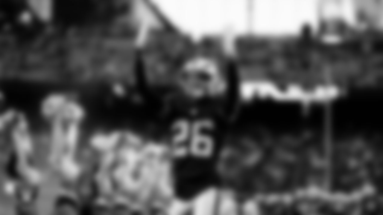 Las Vegas Raiders cornerback Darien Porter (26) is introduced onto the field before the regular season home game against the Kansas City Chiefs at Allegiant Stadium.