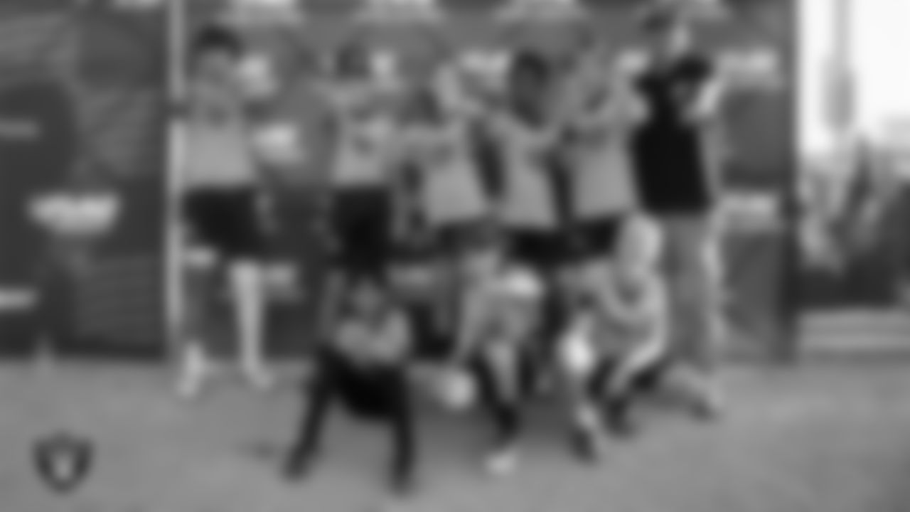 The 12U Dethrone FC pose for a photo after winning the 2024 NFL FLAG Regional Championships and advancing to the 2024 NFL FLAG Championship at Heritage Park.