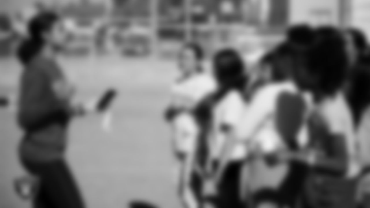 Students participate in activities while learning about flag football, nutrition and mental health during the R.U.S.H. program at J.D. Smith Middle School.