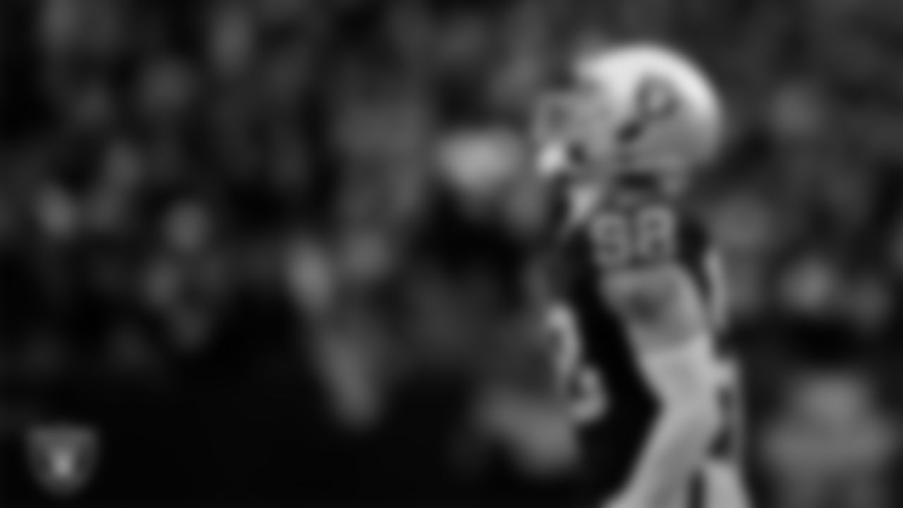 Las Vegas Raiders defensive end Maxx Crosby (98) celebrates after sacking the quarterback during the regular season home game against the Tennessee Titans at Allegiant Stadium.