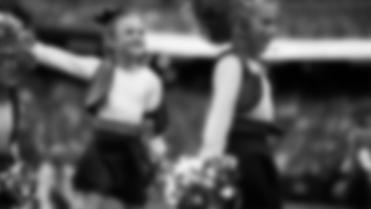 Junior Raiderettes perform on the field before the preseason home game against the San Francisco 49ers at Allegiant Stadium.