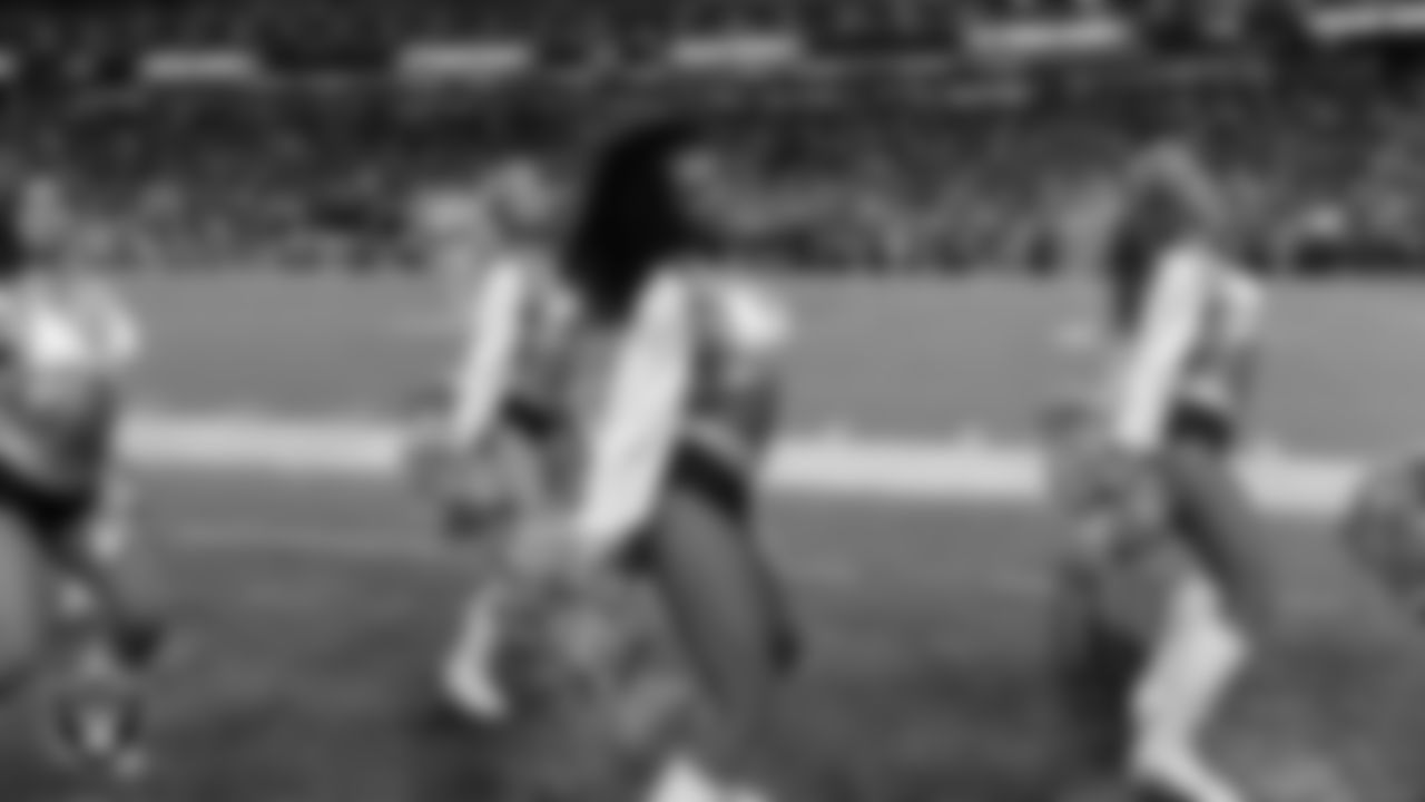 Raiderette Shayla performs on the sidelines during the regular season home game against the Dallas Cowboys at Allegiant Stadium.