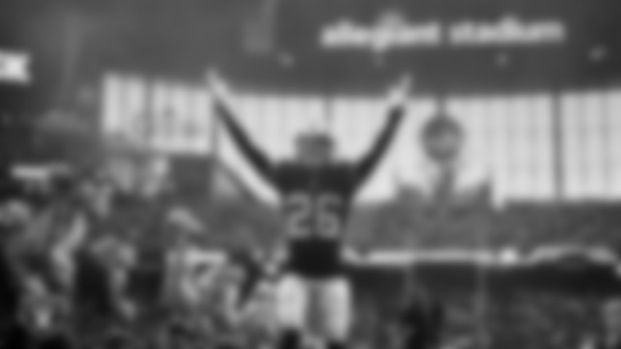 Las Vegas Raiders cornerback Darien Porter (26) is introduced onto the field before the regular season home game against the Denver Broncos at Allegiant Stadium.