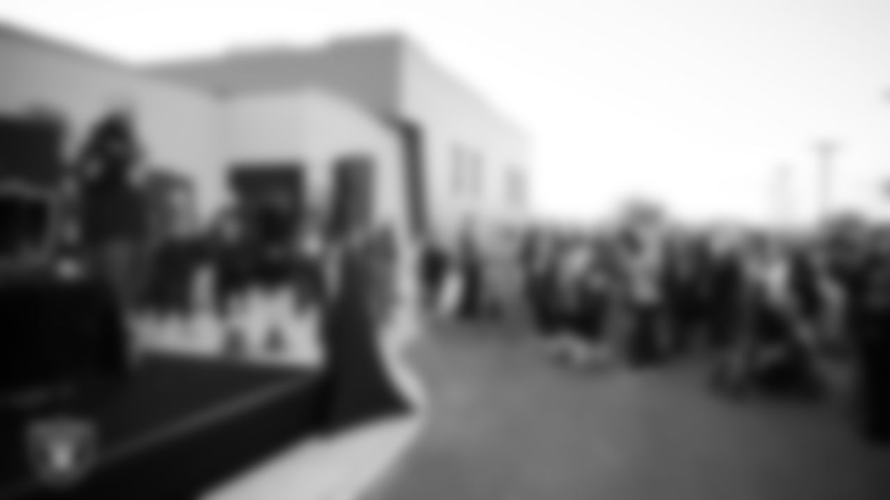 Las Vegas Raiders defensive tackle Adam Butler (69) speaks during the Raiders Holiday Salute at Nellis Air Force Base - Coral Academy.