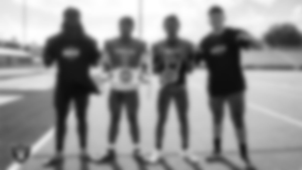 Canyon Springs High School football team members pose for a photo during practice at Canyon Springs High School.