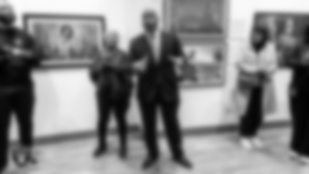 Executive director of the Las Vegas-Clark County Library District Kelvin Watson speaks to attendees as they tour the West Las Vegas Library during the Historic Westside Tour.