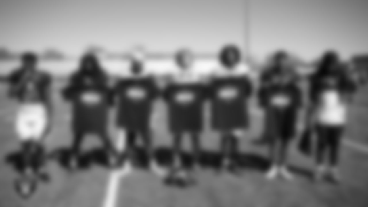 Members of the Arbor View High School football team pose for a photo during practice at Arbor View High School.