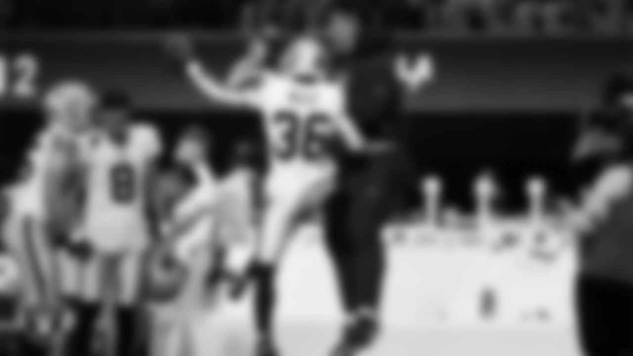 Las Vegas Raiders cornerback Kyu Blu Kelly (36) celebrates with offensvie lineman Laki Tasi (79) after making an interception during the regular season away game against the Los Angeles Chargers at SoFi Stadium.