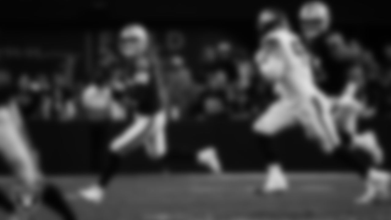 Las Vegas Raiders quarterback Kenny Pickett (15) looks for a receiver during the regular season home game against the Denver Broncos at Allegiant Stadium.