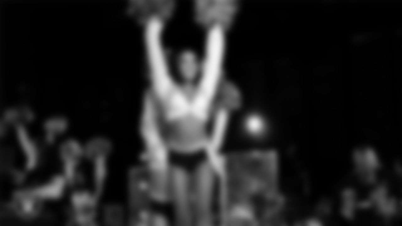 Raiderette Kylie performs with rapper and record producer Lil Jon during halftime at the Las Vegas Raiders regular season home game against the Los Angeles Chargers at Allegiant Stadium.