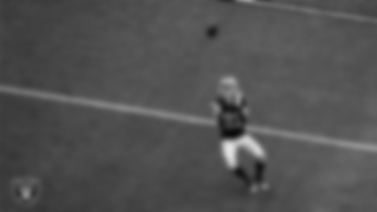 Las Vegas Raiders wide receiver Alex Bachman (81) returns a punt during the regular season home game against the Tennessee Titans at Allegiant Stadium.