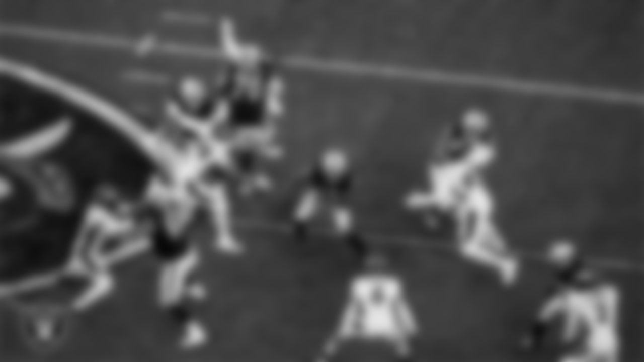 Las Vegas Raiders running back Zamir White (35) rushes during the regular season home game against the Denver Broncos at Allegiant Stadium.
