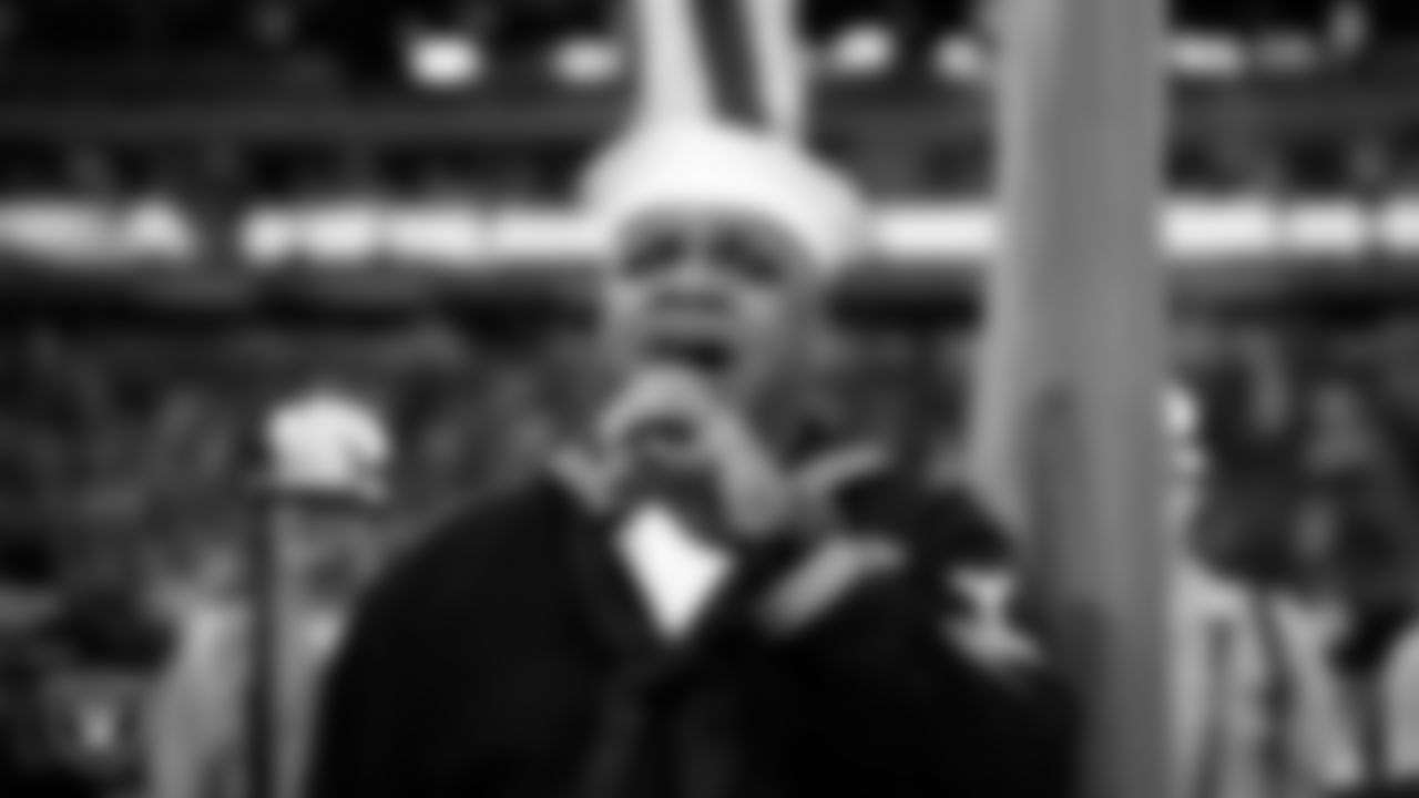 Retired Navy officer and singer Generald Wilson performs the national anthem before the Las Vegas Raiders' regular season home game against the Tennessee Titans at Allegiant Stadium.