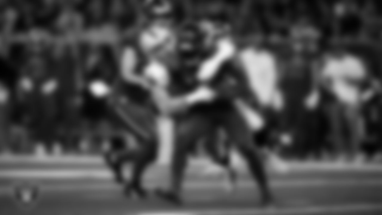 Las Vegas Raiders defensive end Maxx Crosby (98) makes a tackle during the regular season away game against the Houston Texans at NRG Stadium.