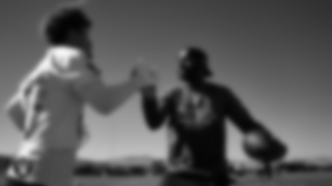 Las Vegas Raiders safety Tristin McCollum (27) and defensive quality control coach Beyah Rasool during practice at Intermountain Health Performance Center.