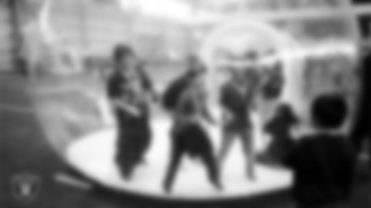 Students enjoy an activity during a Raiders Youth Holiday Party at Intermountain Health Performance Center.