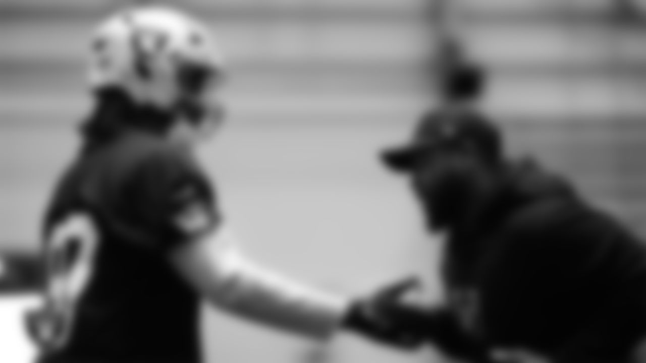 Las Vegas Raiders defensive tackle Tonka Hemingway (97) and assistant defensive line coach Kenyon Jackson at an Organized Team Activity (OTA) at Intermountain Health Performance Center.