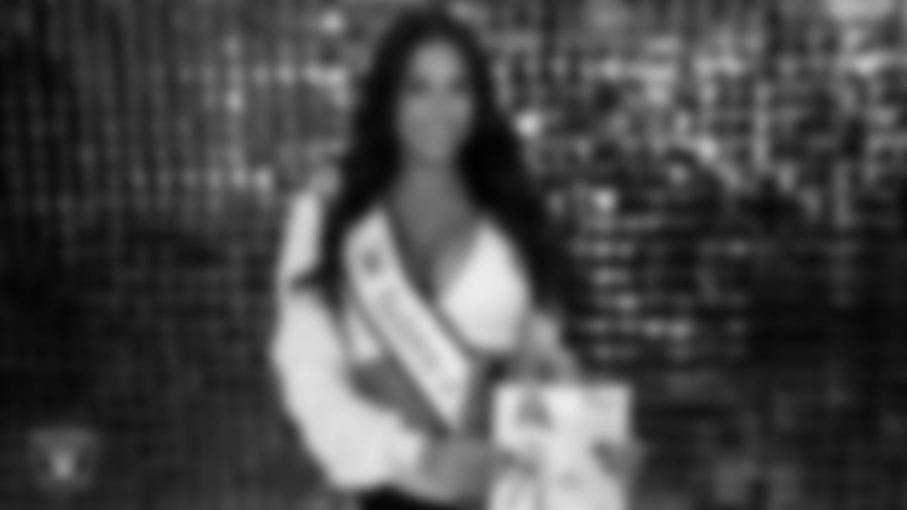 Raiderette Raegen is named Raiderette of the Game in the locker room before the regular season home game against the Denver Broncos at Allegiant Stadium.