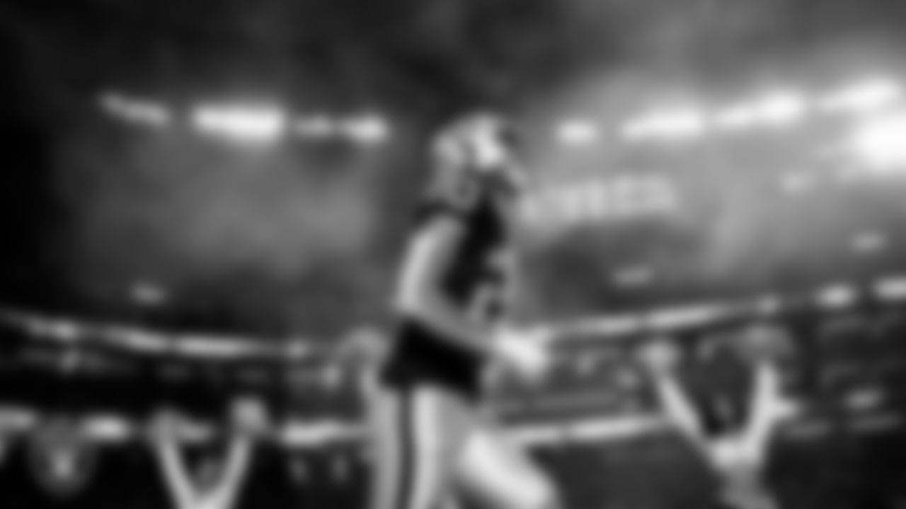 Las Vegas Raiders safety Isaiah Pola-Mao (20) is introduced onto the field before the regular season home game against the Los Angeles Chargers at Allegiant Stadium.