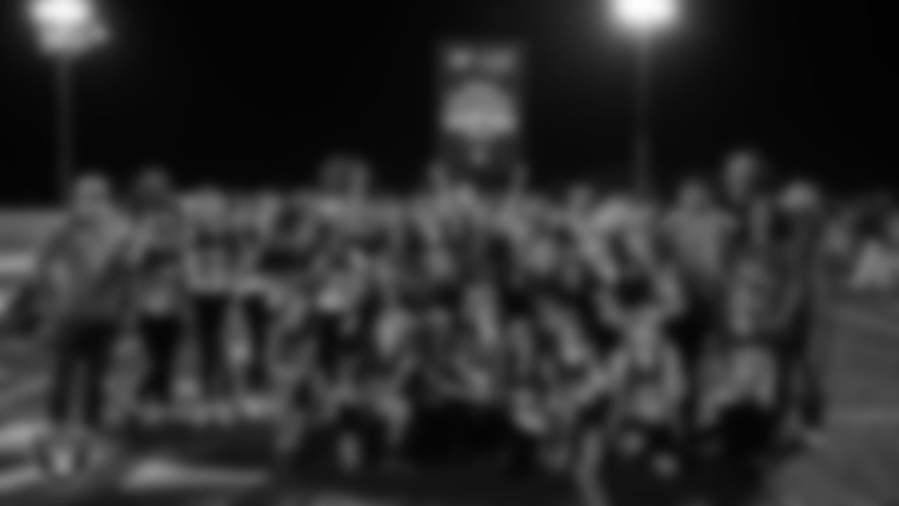 The Charles Arthur Hughes Middle School girls flag football team poses for a photo after winning a 2025 Middle School Flag Football Championship game at All American Park.