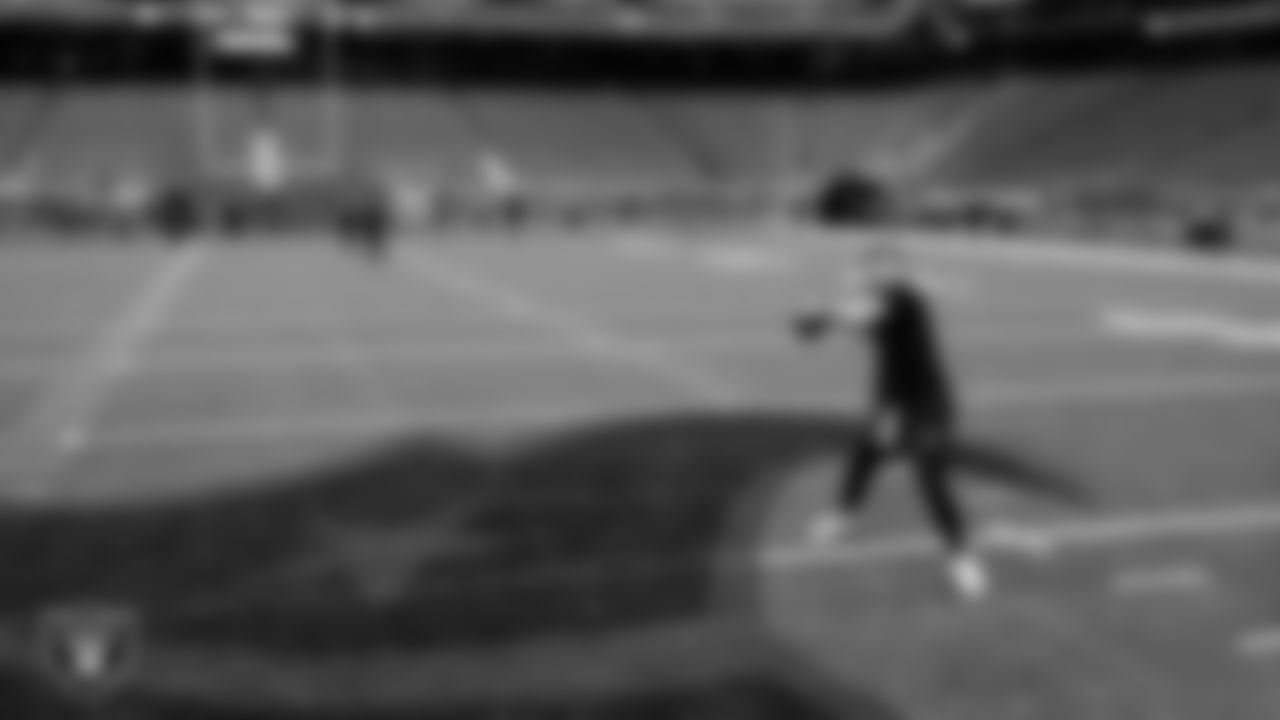 Las Vegas Raiders quarterback Kenny Pickett (15) warming up before the regular season away game against the Houston Texans at NRG Stadium.