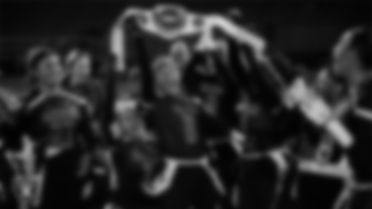 The Spring Valley High School flag football celebrates with the championship belt after the Las Vegas Raiders Flag Football Showcase game against Cimarron High School at Spring Valley High School.