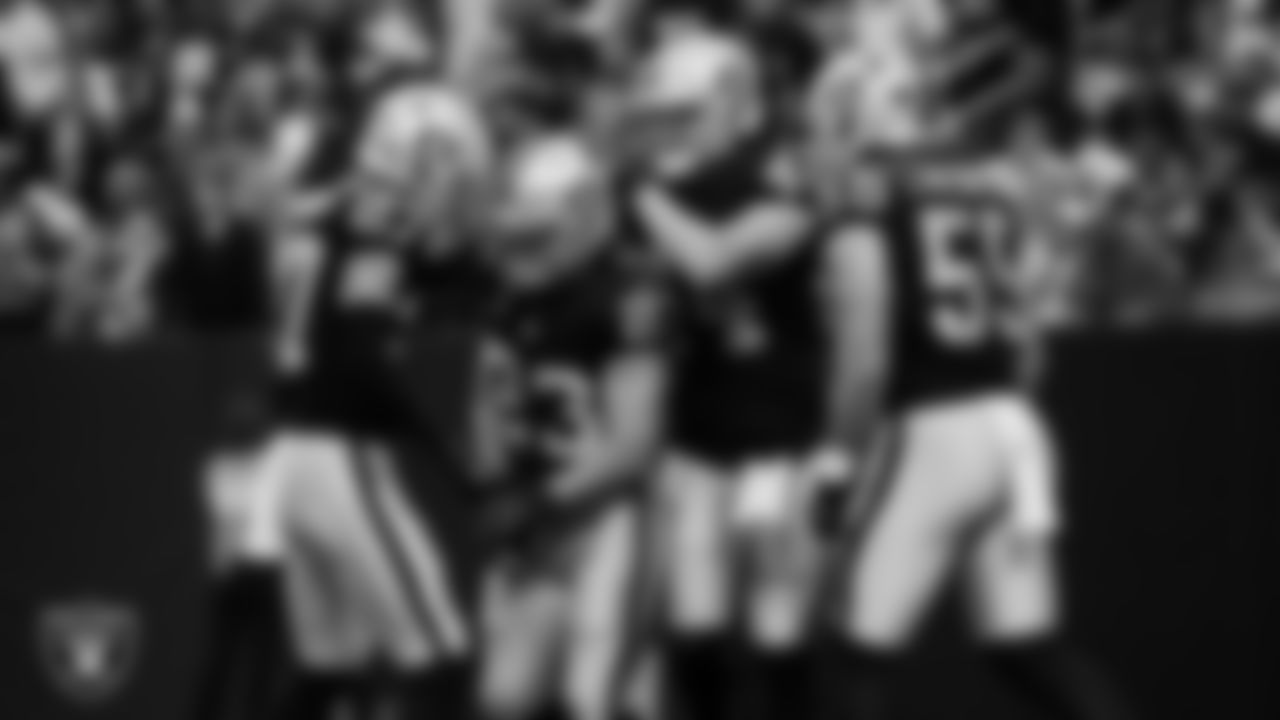 Las Vegas Raiders running back Dylan Laube (23) celebrates with teammates after making a tackle during the regular season home game against the Denver Broncos at Allegiant Stadium.