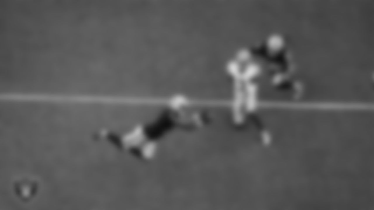 Las Vegas Raiders safety Jeremy Chinn (11) intercepts a pass during the preseason home game against the San Francisco 49ers at Allegiant Stadium.