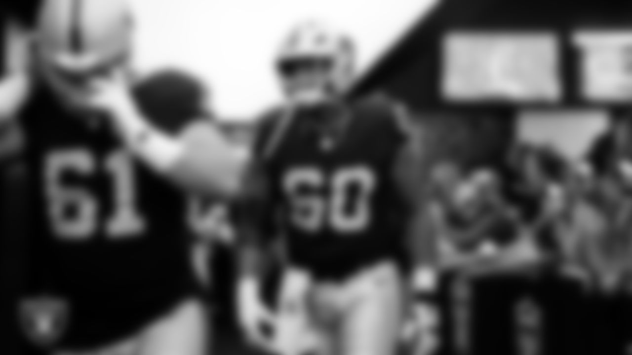 Las Vegas Raiders tackle Charles Grant (60) walks down the tunnel before the regular season home game against the Denver Broncos at Allegiant Stadium.