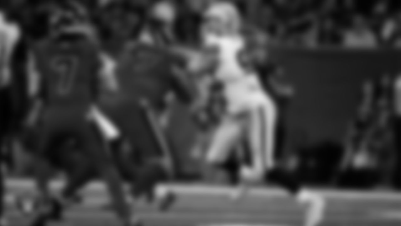 Las Vegas Raiders defensive end Maxx Crosby (98) pressures the quarterback during the regular season away game against the Houston Texans at NRG Stadium.