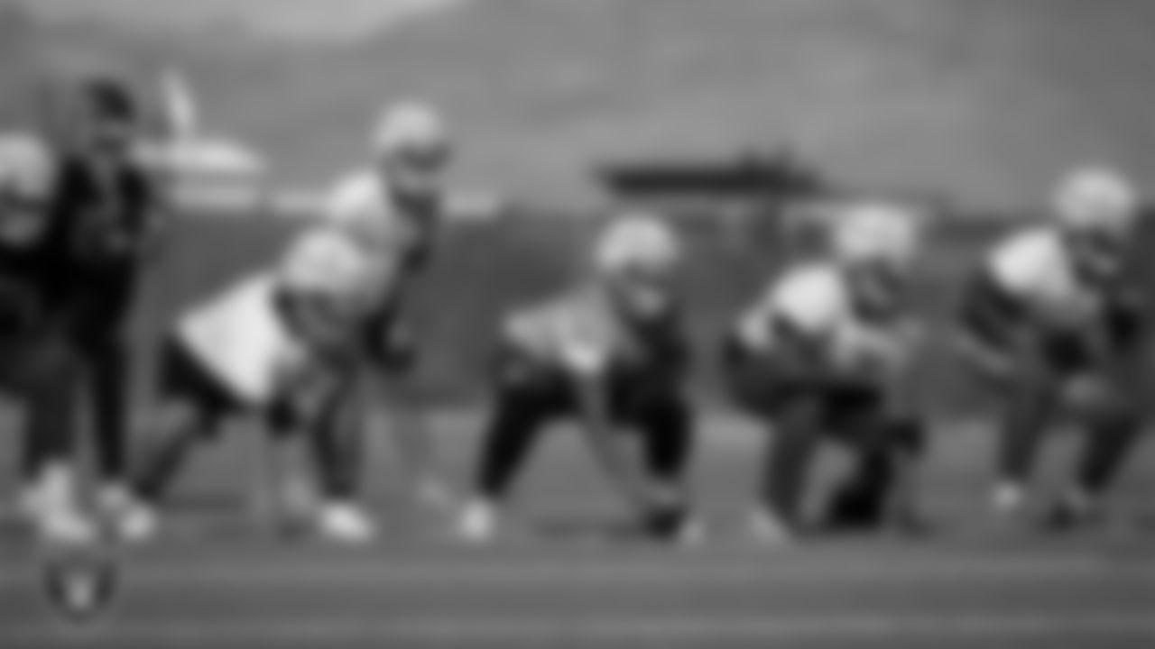 Centennial High School football team members during practice at Centennial High School.