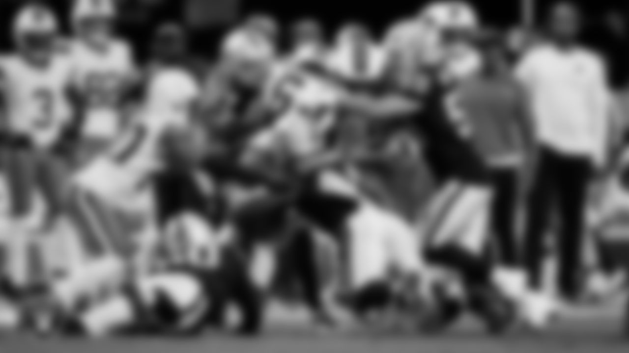 Las Vegas Raiders long snapper Jacob Bobenmoyer (50), safety Tristin McCollum (27), linebacker Tommy Eichenberg (44) and linebacker Jon Rhattigan (59) go to make a tackle during the regular season home game against the Cleveland Browns at Allegiant Stadium.