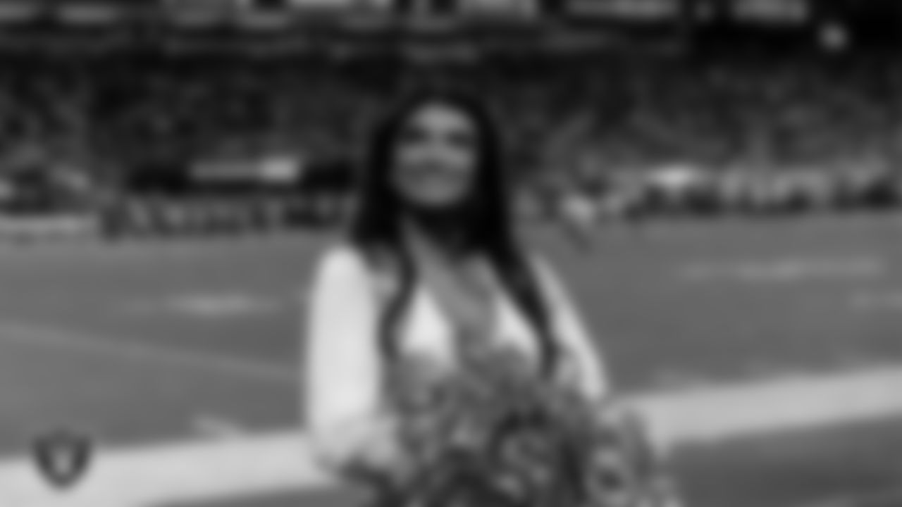 Raiderette Kylee on the sidelines during the regular season home game against the Dallas Cowboys at Allegiant Stadium.