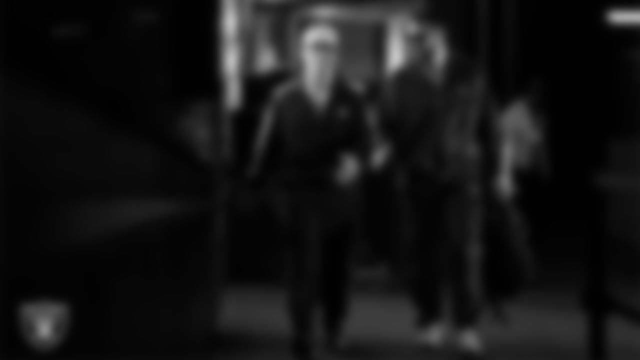 Las Vegas Raiders running back Dylan Laube (23) and linebacker Jon Rhattigan (59) arrive to the regular season home game against the Kansas City Chiefs at Allegiant Stadium.