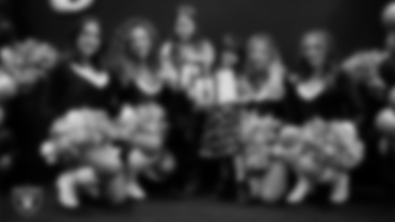 Raiderettes pose for a photo with Junior Raiderettes during the Junior Raiderettes Banquet at The Studio.