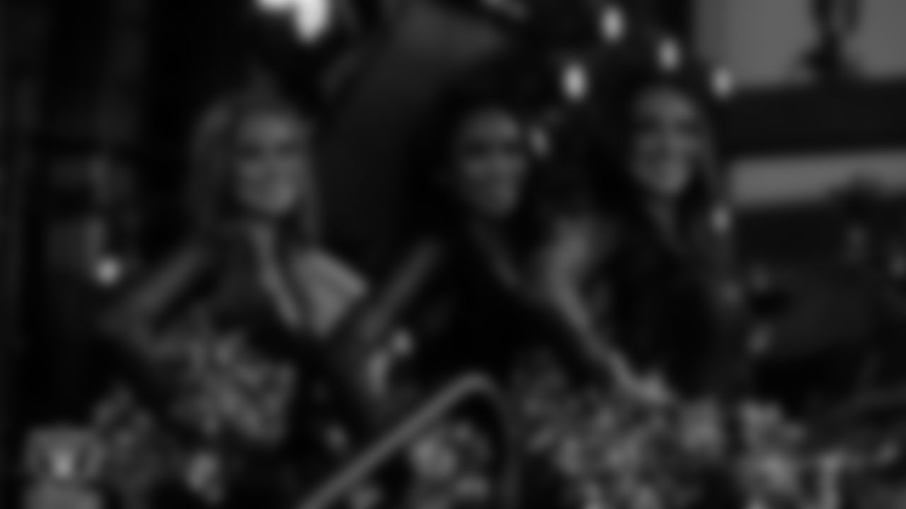 Raiderettes Madisyn, Cierra and Cheyanne wait to perform with Rapper Nelly at halftime during the regular season home game against the Dallas Cowboys at Allegiant Stadium.