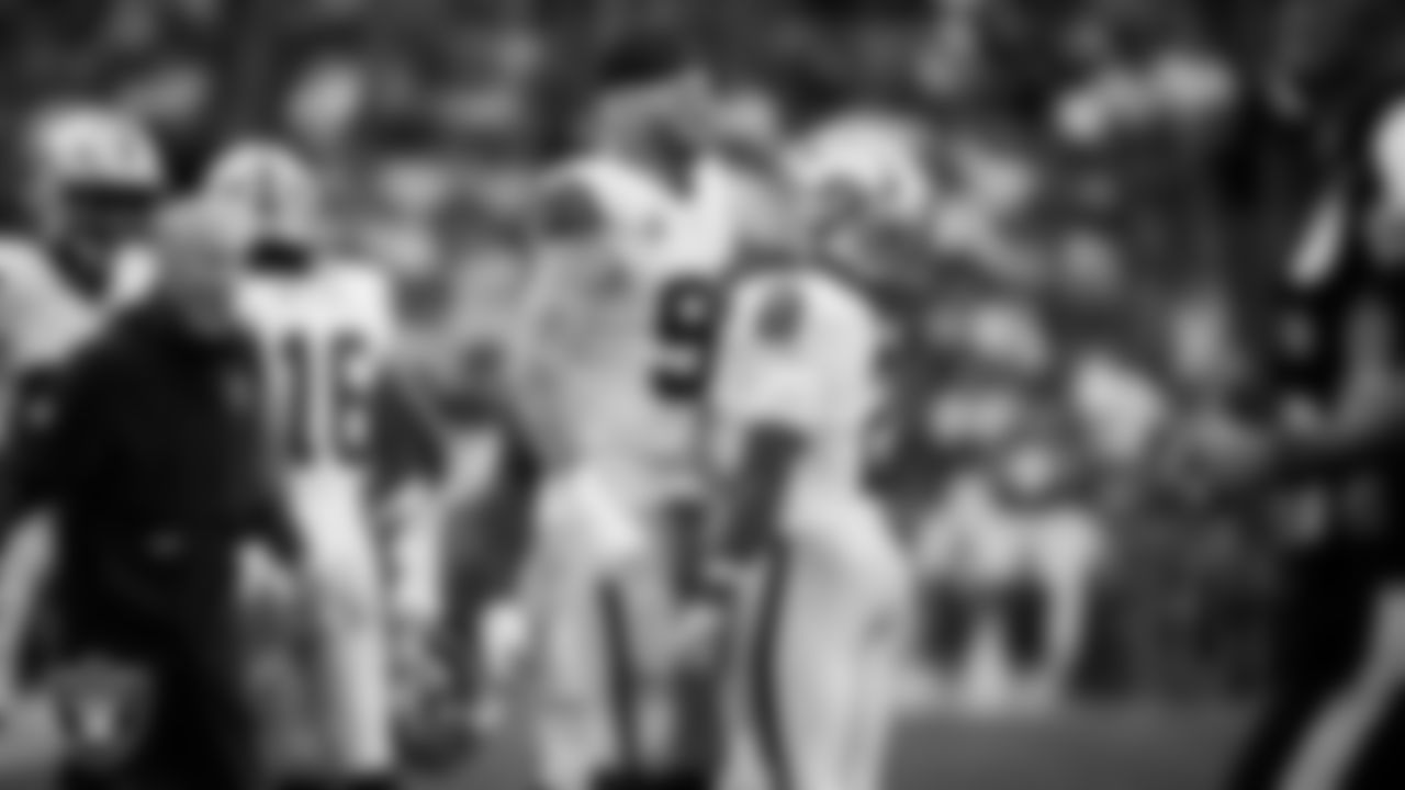 Las Vegas Raiders running back Ashton Jeanty (2) celebrates with defensive end Maxx Crosby (98) after rushing for a 3-yard touchdown during the regular season away game against the New England Patriots at Gillette Stadium.