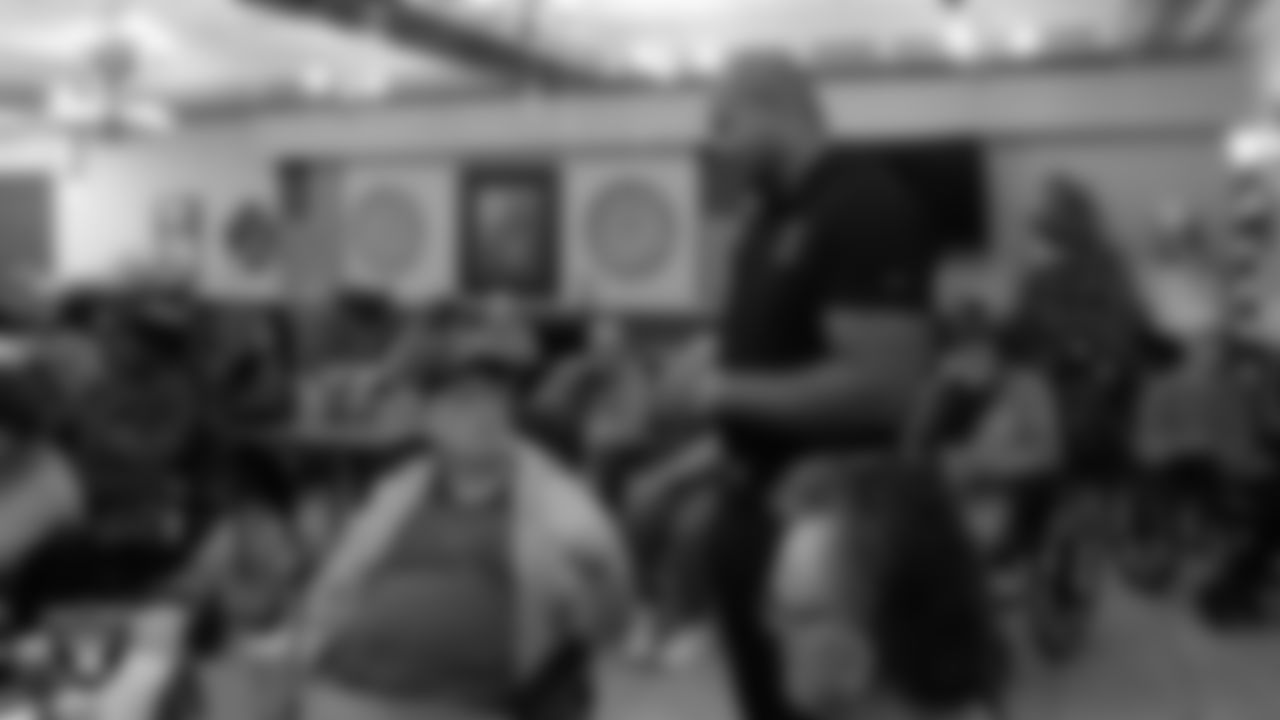 Las Vegas Raiders alumnus Grant Irons speaks to a veteran during the annual Cox Salute to Service Tailgate at Southern Nevada State Veterans Home.