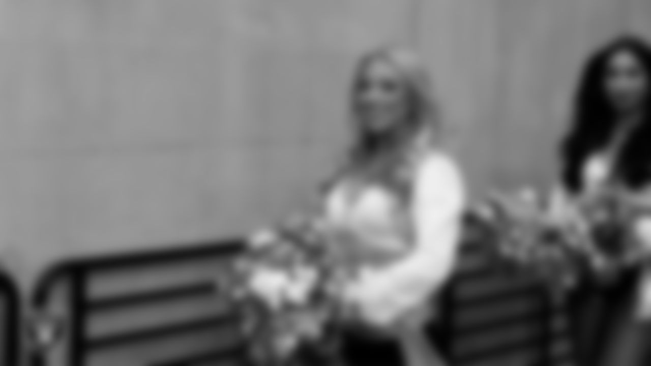 Raiderette Delaney walks through the tunnel before the regular season home game against the Cleveland Browns at Allegiant Stadium.