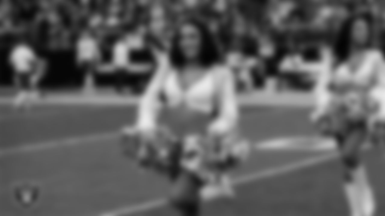 Raiderette Kylie walks onto the field for a performance before the regular season home game against the Kansas City Chiefs at Allegiant Stadium.