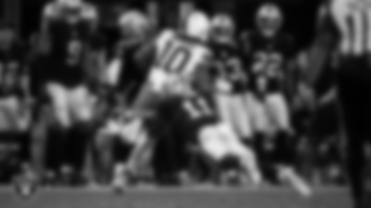 Las Vegas Raiders safety Jeremy Chinn (11) makes a tackle during the regular season home game against the Cleveland Browns at Allegiant Stadium.