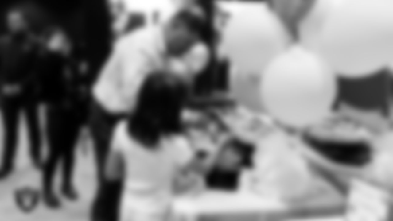 Attendees enjoy snacks during the Valentine's Day Dance at The Studio.