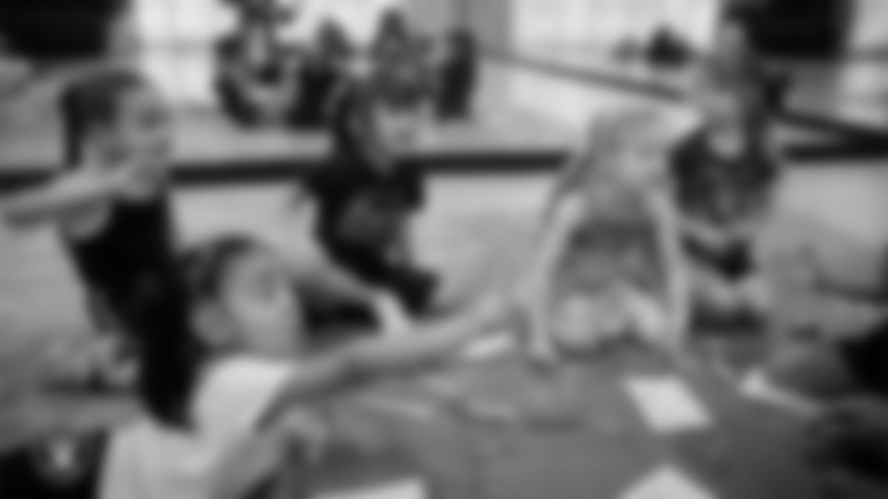 Dancers color during day one of summer camp at The Studio.