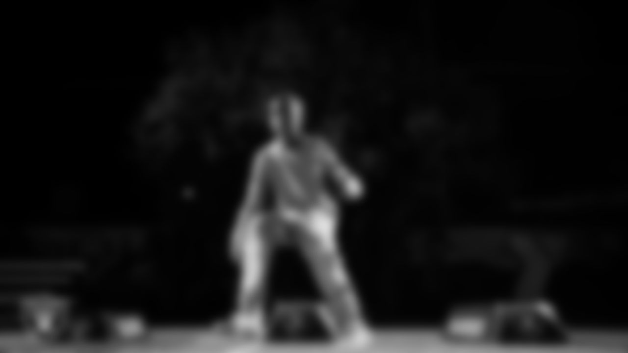 An athlete takes part in a Silver and Black League flag football clinic at Bill and Lillie Heinrich YMCA.