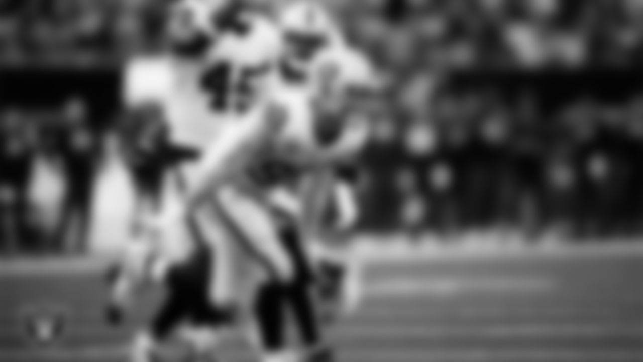 Las Vegas Raiders defensive end Maxx Crosby (98) celebrates after sacking the quarterback during the regular season away game against the Los Angeles Chargers at SoFi Stadium.
