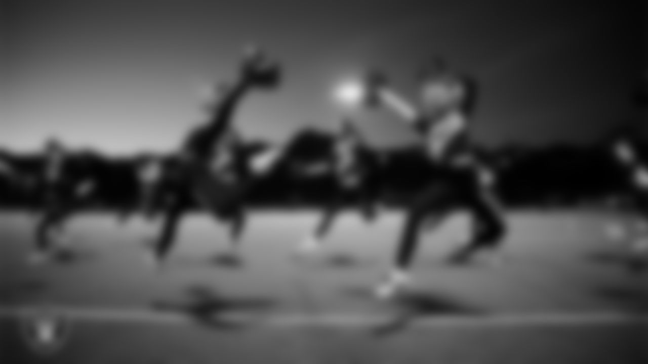 The Doral Academy Red Rock cheerleaders perform during halftime of the Las Vegas Raiders' High School Flag Football Showcase game between Doral Academy Red Rock and Democracy Preparatory Academy at Agassi Campus at Agassi Campus at Doral Academy Red Rock.