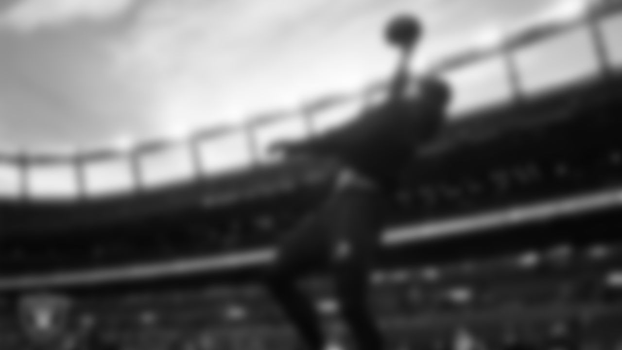 Las Vegas Raiders wide receiver Jack Bech (18) warming up before the regular season away game against the Denver Broncos at Empower Field at Mile High.