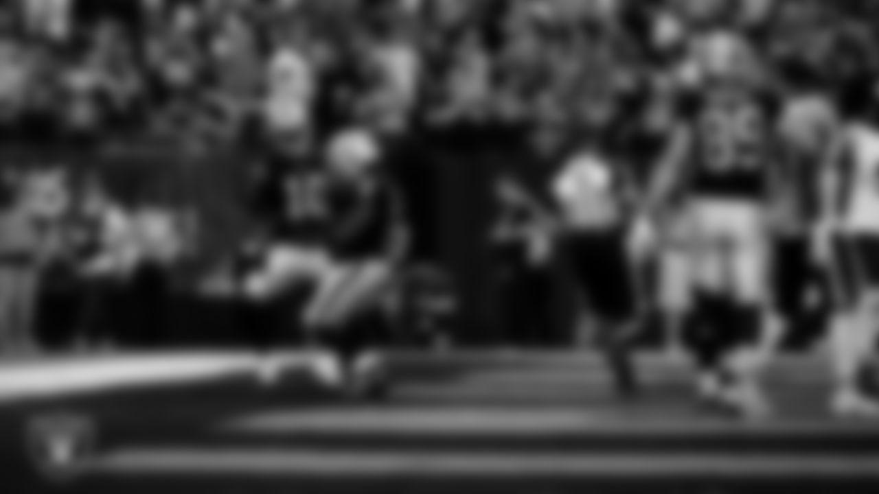 Las Vegas Raiders running back Ashton Jeanty (2) celebrates with wide receiver Dont'e Thornton Jr. (10) after making a 9-yard touchdown catch during the regular season home game against the Chicago Bears at Allegiant Stadium.