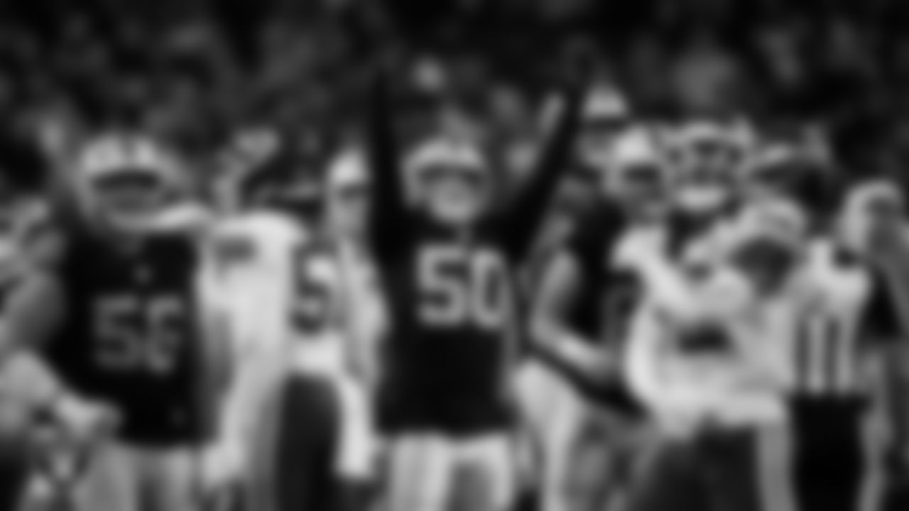 Las Vegas Raiders long snapper Jacob Bobenmoyer (50) celebrates kicker Daniel Carlson's (8) 55-yard field goal during the regular season home game against the Kansas City Chiefs at Allegiant Stadium.